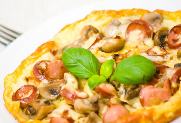 Omelet with mushrooms, sausage and cheese — Stock Photo, Image