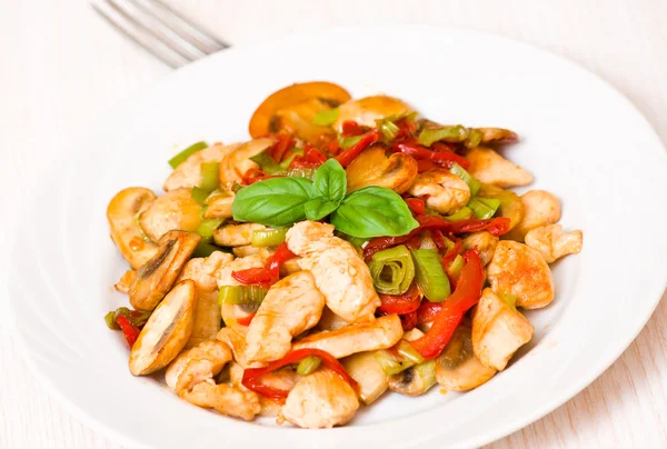 Chicken with sweet peppers and mushrooms — Stock Photo, Image