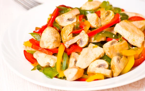 Chicken with sweet peppers and mushrooms — Stock Photo, Image