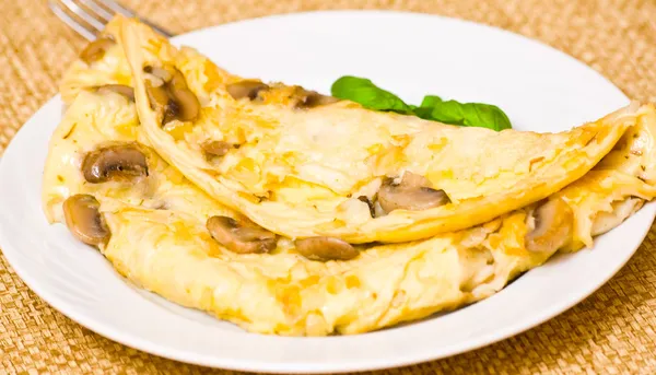 Omelette with mushrooms — Stock Photo, Image