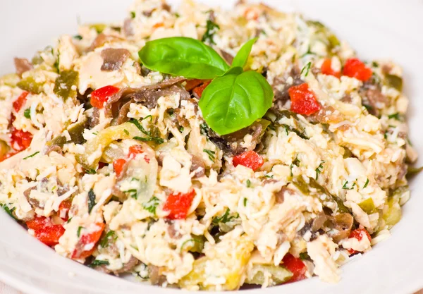 Salad with chicken, mushrooms, eggs, cheese, vegetables — Stock Photo, Image