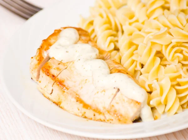 Chicken breast with Fusilli pasta — Stock Photo, Image