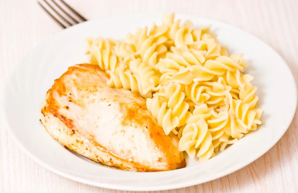 Chicken breast with Fusilli pasta — Stock Photo, Image