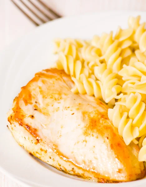 Chicken breast with Fusilli pasta — Stock Photo, Image
