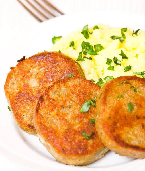 Fishcakes with mashed potatoes — Stock Photo, Image
