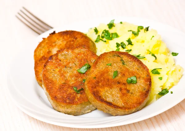 Fishcakes with mashed potatoes — Stock Photo, Image