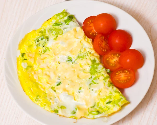 Omelette with tomato — Stock Photo, Image
