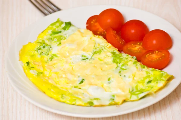 Omelette with tomato — Stock Photo, Image