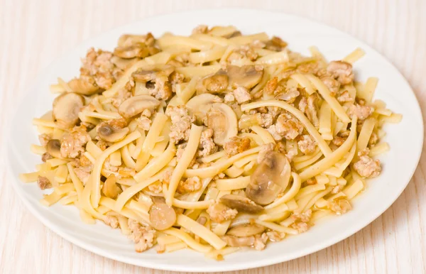 Pasta with mushroom and minced meat — Stock Photo, Image