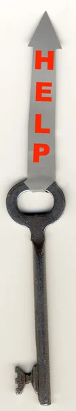Vintage key with badge Help — Stok fotoğraf