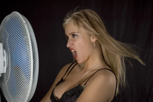 Blonde with fan — Stock Photo, Image