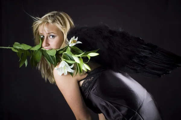 Angel with lily — Stock Photo, Image