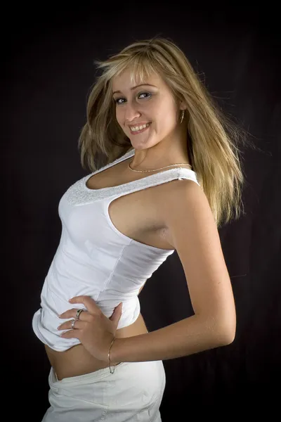 Blond leker med hennes skjorta och egna bröst — Stockfoto
