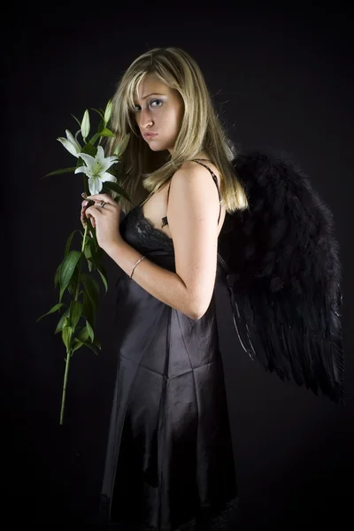 Angel with lily — Stock Photo, Image