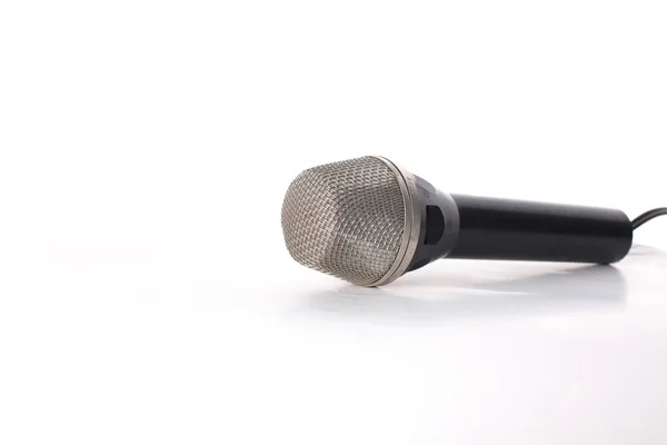 Microphone argenté avec fil noir isolé sur blanc — Photo