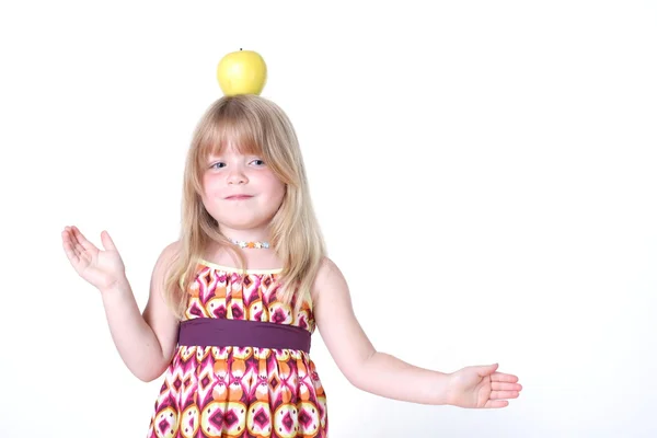 Small girl with apple — Stock Photo, Image