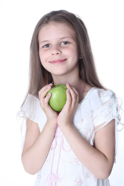 Bambina con mela isolata su bianco — Foto Stock