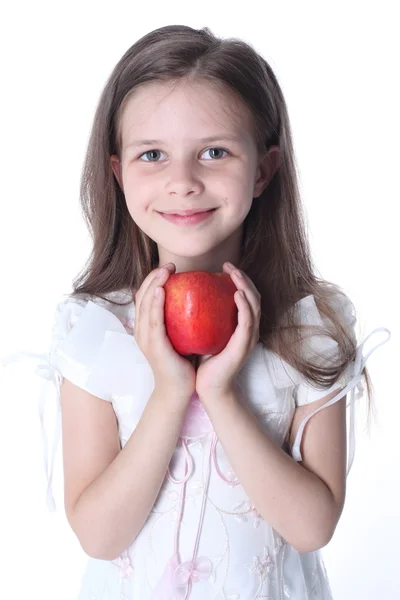 Bambina con mela isolata su bianco — Foto Stock