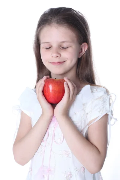 Menina com maçã isolada no branco — Fotografia de Stock