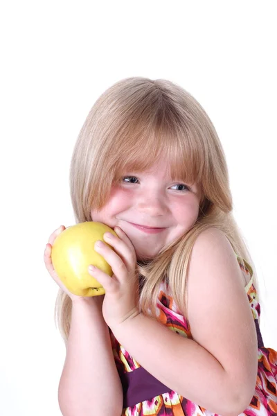 Mała dziewczynka z jabłkiem — Zdjęcie stockowe