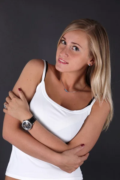 Young beautiful women posing in white singlet. — Stock Photo, Image