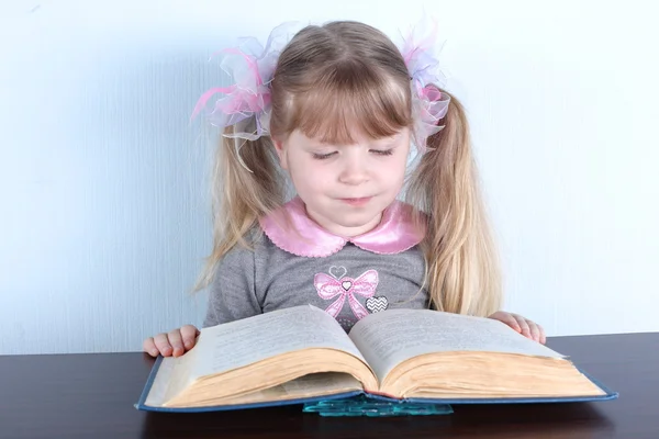 Little girl with books — Stock Photo, Image