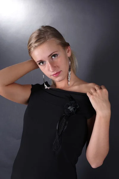 Portrait of the beautiful blonde on a black background — Stock Photo, Image