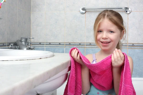 Little girl washing in bathroom — Stock Photo, Image