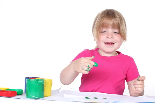 Girl with paint isolated on white — Stock Photo, Image