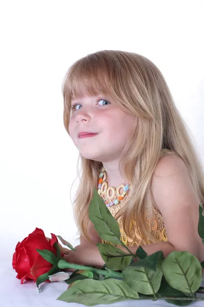 Little girl with flower — Stock Photo, Image