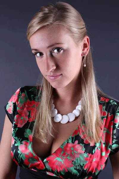 Portrait of the beautiful blonde on a black background — Stock Photo, Image