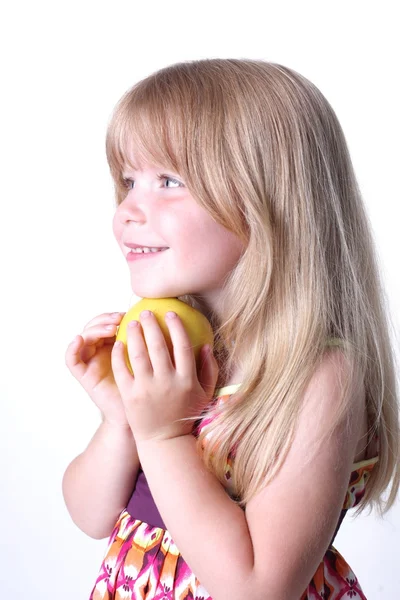 Small girl with apple — Stock Photo, Image