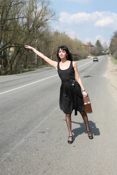 Menina na estrada — Fotografia de Stock