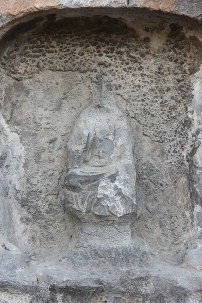 Detalj av huggen sten buddha — Stockfoto