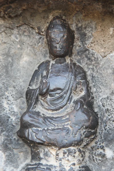 Detalj av huggen sten buddha — Stockfoto