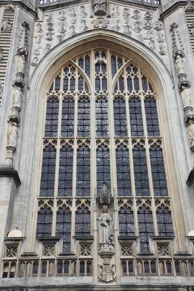 Ancient statue on bath abbey — Stock Photo, Image