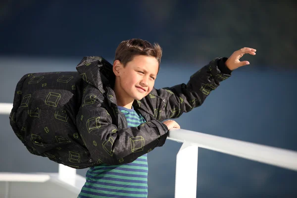 Boy catching wind — Stock Photo, Image