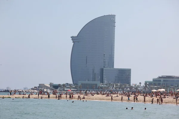 Barcelona beach vith view on Vela Hotel — Stock Photo, Image