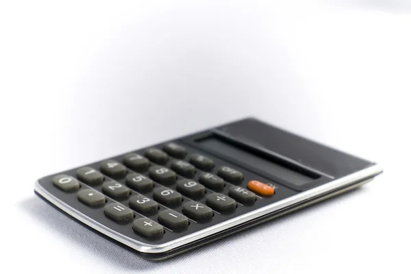 Calculatrice sur fond blanc — Photo