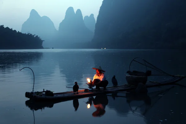 Homem chinês pesca — Fotografia de Stock