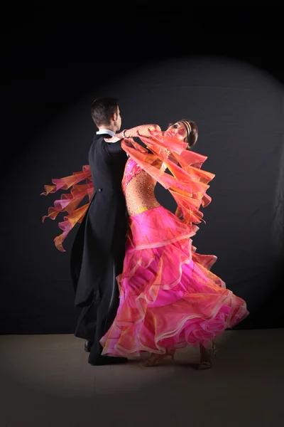 Latino dancers in ballroom isolated on black background — Stock Photo, Image