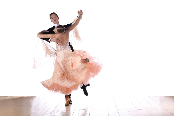 Dancers in ballroom against white background — Stock Photo, Image