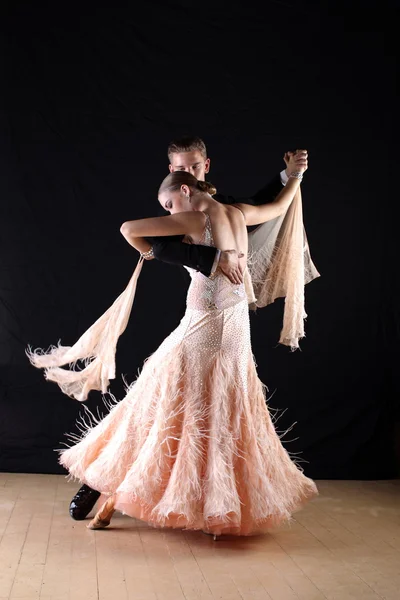 Dancers in ballroom against white background — Stock Photo, Image