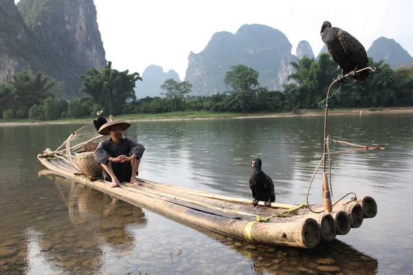 Homem chinês pesca — Fotografia de Stock