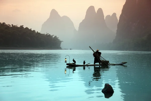 Chinese man fishing — Stock Photo, Image