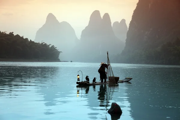 Chinese man fishing — Stock Photo, Image