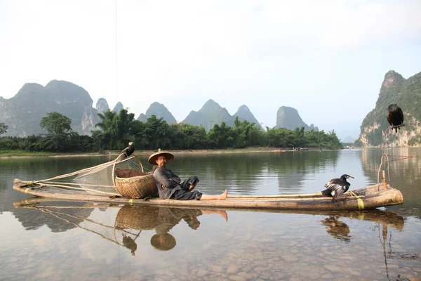 Chinese man fishing — Stock Photo, Image