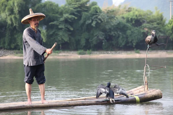 Uomo cinese pesca — Foto Stock