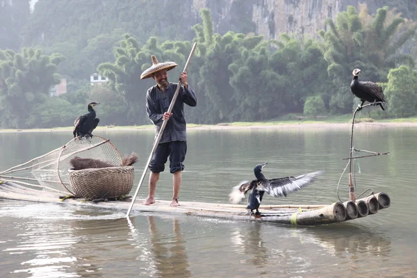 Uomo cinese pesca — Foto Stock