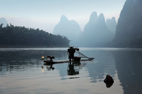 Çinli adam Balık tutma — Stok fotoğraf
